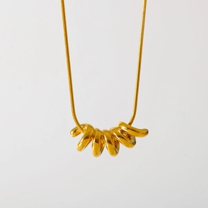 Polished gold plated stainless steel snake chain necklace with intertwined ring pendant