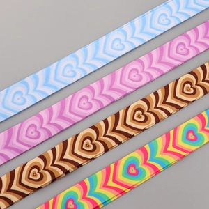 Polyester lanyards showing heart patterns in blue, pink, brown, and rainbow colors