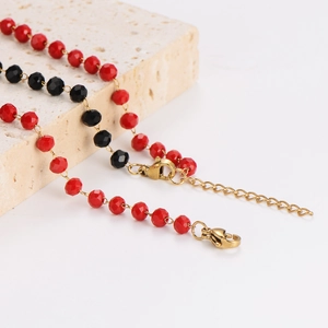 Minimalist red and black beaded bracelets with gold plated lobster clasp on stone