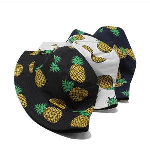 Women's summer bucket hats with colorful pineapple print in black, white, and navy blue