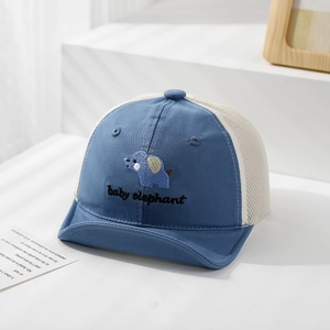 Close-up of baby sun hat featuring elephant embroidery and breathable mesh texture