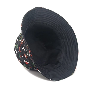 Black Christmas bucket hat with festive reindeer, tree and snowflake print for outdoors