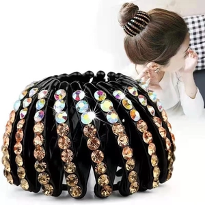 Close-up of sparkling champagne rhinestones on a velvet nest hair clip for bun styling