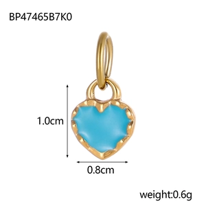 Detailed view of sky blue heart pendant with gold plating and size measurements