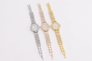 Three crystal flower watches in silver, rose gold and gold finishes shown in detail