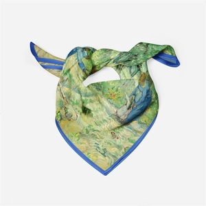 Detail of artistic oil painting silk scarf with elegant blue border on white background