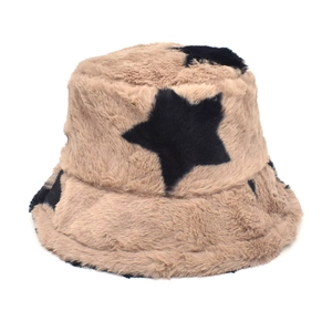 Detailed texture of khaki rabbit fur bucket hat with black pentagram star patterns