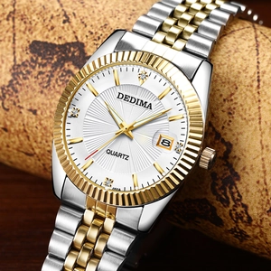 Macro shot of gold-silver stainless steel watch with diamond dial and date window