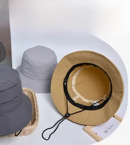 Three outdoor sun hats in grey and khaki with adjustable windproof chin straps