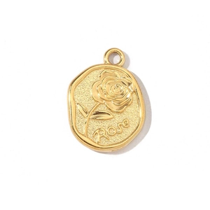 Close-up of gold-plated stainless steel oval pendant with embossed rose and Rose engraving