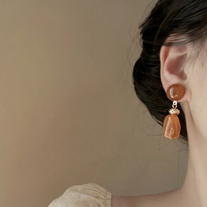 Retro amber geometric earrings with irregular resin texture and gold metal accents