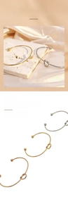 Detailed view of minimalist knot design open bracelets in gold, silver, and rose gold
