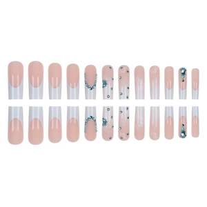Pink and white French press-on nails with blue rhinestones and floral nail art kit