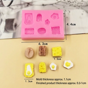 Mini silicone breakfast mold for croissant and egg shapes with detailed size measurements