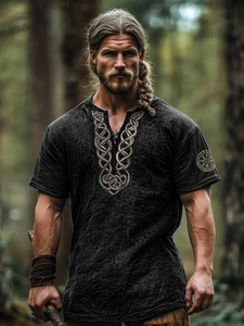 Detailed view of Viking V-neck shirt with Celtic knot embroidery and lacing texture