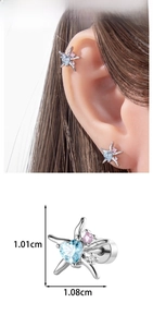 Macro detail of starfish cartilage stud with blue heart zircon and size measurements
