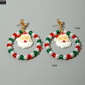 Detailed view of handmade beaded Christmas Santa Claus earrings with size dimensions