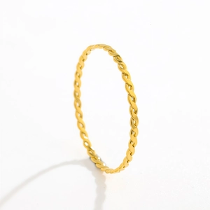 Minimalist golden twisted rope ring in polished titanium steel for women's fashion