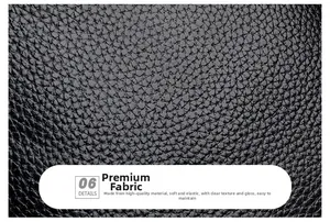Close-up of premium black lychee-grain leather texture with a glossy and soft finish
