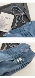 Close-up of blue denim tote bag with silver chain strap and metal turn-lock closure