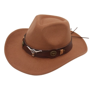 Brown western felt cowboy hat with rolled brim featuring a bull head leather band