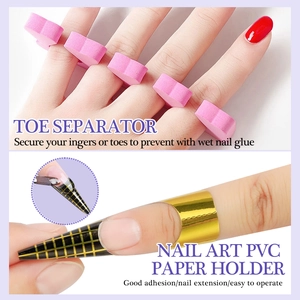 Manicure set with pink heart toe separators and golden nail extension forms