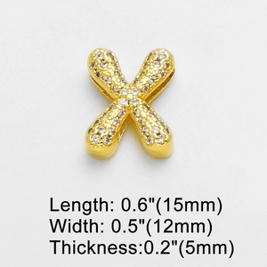Detail of gold letter X pendant with sparkling zircon inlays and precise dimensions