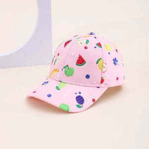 Detailed view of children's pink baseball cap featuring cute colorful fruit prints