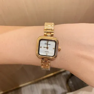 Elegant gold square watch for women with mother of pearl dial and crystal markers