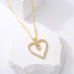 Gold-plated double heart pendant necklace with cubic zirconia on a paperclip chain