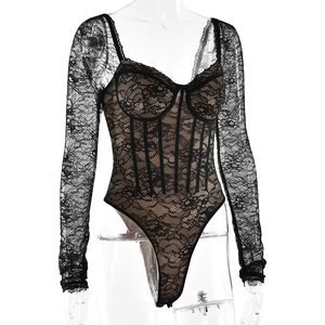 Close-up of black lace bodysuit featuring long sleeves and intricate floral patterns