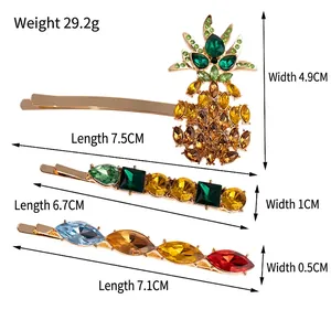 Three-piece vintage metal hair clip set with rhinestone pineapple and geometric designs
