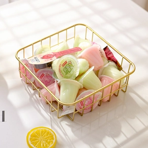 Golden rectangular metal fruit basket with minimalist wire design for home storage