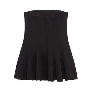 Detailed view of the black off-shoulder mini dress with pleated texture and wavy hem