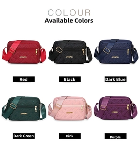 Collection of quilted oxford fabric crossbody bags shown in six different vibrant colors