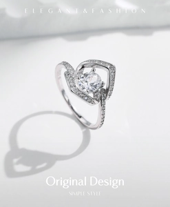 Macro shot of S925 sterling silver ring featuring a round center stone and pave diamond details