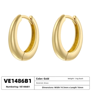 Close-up of gold plated brass U-shaped oval earrings with 14.5mm width and 16mm height