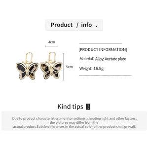 Detailed size specifications for acetate butterfly earrings in gold-tone alloy and leopard print
