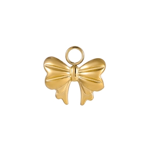 Macro shot of gold-plated stainless steel bow pendant with round hanging loop for jewelry