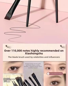 Detailed view of 0.06mm ultra-fine angled blade eyeliner brush for precise eye makeup
