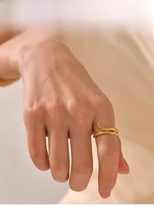 Detailed view of the 18K gold plated snake ring showing intricate scale textures on skin