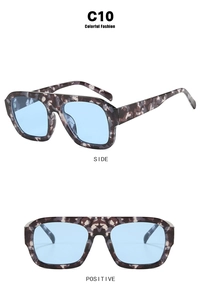 Detail view of square tortoiseshell sunglasses with light blue lenses and C10 frame model