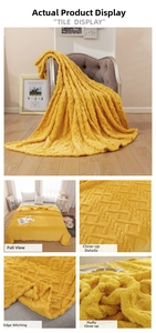 Detailed view of yellow 3D jacquard flannel blanket showing soft texture and geometric patterns