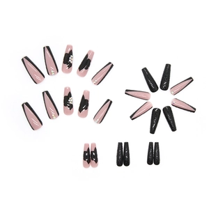 Long coffin press-on nails in pink and black contrast with floral patterns and rhinestones