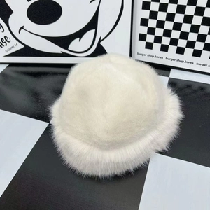 Winter fluffy white faux fur bucket hat with thick plush texture and soft aesthetic