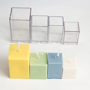 Square acrylic candle molds set with finished pillars in four different heights