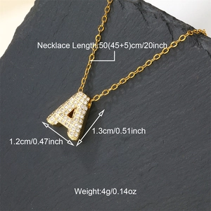 Detail of gold letter A pendant necklace with clear cubic zirconia and dimensions