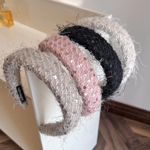 Set of four plush headbands with sequins in grey beige, pink, black, and off-white colors