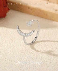 Close-up of S925 sterling silver star and moon ring with pavé-set sparkling zircons