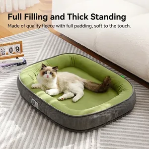 Washable pet bed in grey and green plush fabric, oval shape for cats and dogs